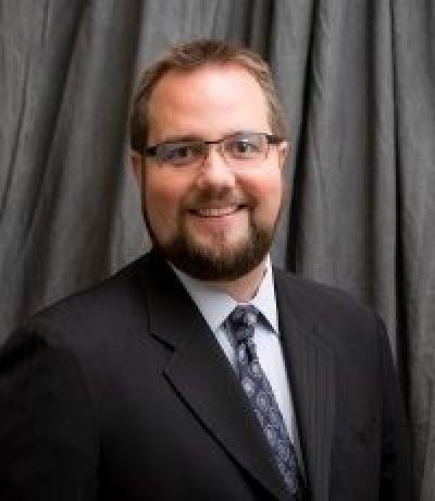 Joshua E. Karoly